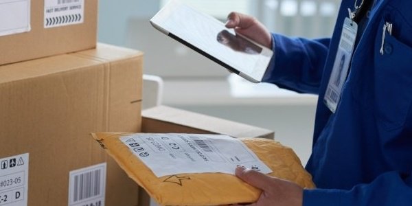 Holding a padded envelope